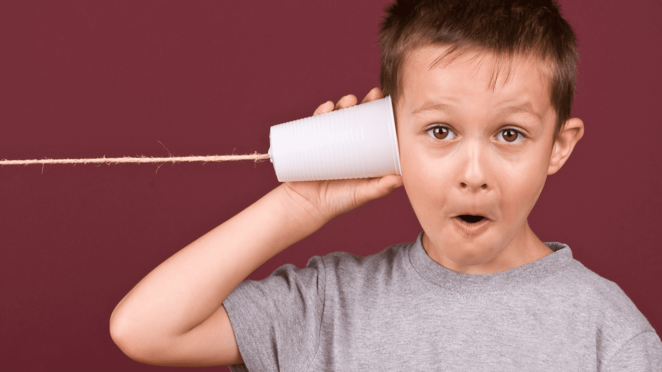 kid with a tin can communicating